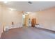 Empty bonus room with light peach walls and carpet at 2685 Cr 564, Bushnell, FL 33513