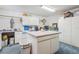 Craft room featuring a large island and storage at 2685 Cr 564, Bushnell, FL 33513