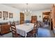 Bright dining room featuring a large table and wood furniture at 2685 Cr 564, Bushnell, FL 33513