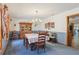 Formal dining room with a large table and chandelier at 2685 Cr 564, Bushnell, FL 33513