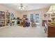 Home office with built-in bookshelves and patio access at 2685 Cr 564, Bushnell, FL 33513