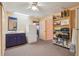 Storage or utility room with shelving and sink at 2685 Cr 564, Bushnell, FL 33513