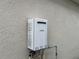 Rinnai tankless water heater on exterior wall at 29320 Armoyan Blvd, Leesburg, FL 34748