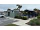 View of the community pool, bathroom and pergola at 29320 Armoyan Blvd, Leesburg, FL 34748