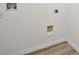 Laundry area with tile flooring and hookups at 29360 Caspian St, Leesburg, FL 34748