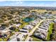 Wide aerial view of the community and surrounding area at 2941 Tangerine Ct, Leesburg, FL 34748