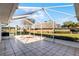 View from the patio, showing a view of the backyard and other homes at 2941 Tangerine Ct, Leesburg, FL 34748