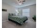 Bedroom with a full bed and ceiling fan at 307 Batesburg Way, The Villages, FL 32162