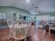 Bright dining area with a round table and four chairs at 307 Batesburg Way, The Villages, FL 32162