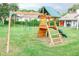 Large backyard with playground set at 31 Sand Lake Pl, Eustis, FL 32726