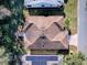 Aerial view of house and surrounding landscape at 32622 Oak Park Dr, Leesburg, FL 34748