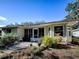 Exterior view of house, showcasing the backyard patio at 32622 Oak Park Dr, Leesburg, FL 34748