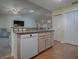 Kitchen boasts ample counter space and a dishwasher at 32622 Oak Park Dr, Leesburg, FL 34748