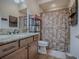 Clean bathroom with granite countertop and shower at 3281 Bell Ter, The Villages, FL 32163