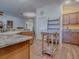 Modern kitchen with granite countertops and wood cabinets at 3281 Bell Ter, The Villages, FL 32163