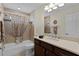 Clean bathroom with tub shower, vanity, and updated fixtures at 3538 Mistletoe Ct, The Villages, FL 32163