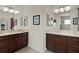 Elegant bathroom with double vanity and updated fixtures at 3538 Mistletoe Ct, The Villages, FL 32163