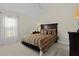 Spacious bedroom with carpeted floor and ample natural light at 3538 Mistletoe Ct, The Villages, FL 32163