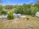 Overhead view of a large backyard with sheds and open space at 3566 Seminole St, Gotha, FL 34734