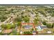 Aerial view of single-story home with pool, large yard, and detached garage at 3566 Seminole St, Gotha, FL 34734