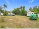 Large backyard with shed, covered structure, and open area at 3566 Seminole St, Gotha, FL 34734