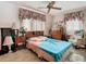 Spacious bedroom with double bed and wood dresser at 3566 Seminole St, Gotha, FL 34734