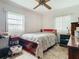 Cozy bedroom with double bed and ceiling fan at 3566 Seminole St, Gotha, FL 34734