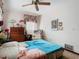 Bedroom with double bed, dresser, and ceiling fan at 3566 Seminole St, Gotha, FL 34734