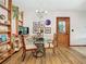 Cozy dining area with glass table and wood chairs at 3566 Seminole St, Gotha, FL 34734