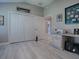 Bright home office features ample storage and wood-look floors at 3590 Ithaca Ter, The Villages, FL 32163