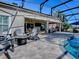 Relaxing pool area with patio and fire pit at 3590 Ithaca Ter, The Villages, FL 32163