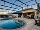 Large pool and patio with covered seating at 3590 Ithaca Ter, The Villages, FL 32163