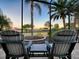 Relaxing screened patio with a view of the yard and sunset at 3590 Ithaca Ter, The Villages, FL 32163