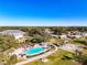 Large community pool and clubhouse near shuffleboard at 3716 Plantation Blvd, Leesburg, FL 34748