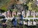 Aerial view of a residential neighborhood with lakefront properties at 3716 Plantation Blvd, Leesburg, FL 34748