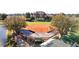 Aerial view of a softball field with covered dugouts and seating at 3716 Plantation Blvd, Leesburg, FL 34748