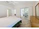 Bedroom with mirrored closet offering views into adjacent rooms at 3716 Plantation Blvd, Leesburg, FL 34748