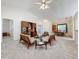 Open living area with vaulted ceiling and hardwood floors at 3716 Plantation Blvd, Leesburg, FL 34748