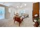 Spacious living room with mid-century modern furniture at 3716 Plantation Blvd, Leesburg, FL 34748