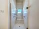 Walk-in shower with glass enclosure and built-in seat at 3716 Plantation Blvd, Leesburg, FL 34748