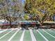 Shuffleboard courts near tennis courts and other amenities at 3716 Plantation Blvd, Leesburg, FL 34748