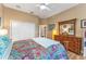 Bright bedroom with a large closet and wood floors at 39335 Harbor Hills Blvd, Lady Lake, FL 32159