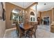 Bright dining room features a large table and opens to other living spaces at 39335 Harbor Hills Blvd, Lady Lake, FL 32159