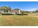 House exterior showcasing a side view and landscaping at 39335 Harbor Hills Blvd, Lady Lake, FL 32159