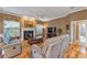 Relaxing living room with hardwood floors, fireplace and comfortable seating at 39335 Harbor Hills Blvd, Lady Lake, FL 32159