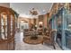 Living room with seating area and built-in hutch at 39335 Harbor Hills Blvd, Lady Lake, FL 32159