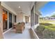 Relaxing screened porch overlooking a golf course at 39335 Harbor Hills Blvd, Lady Lake, FL 32159