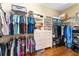 Well-organized walk-in closet with shelving and hanging space for clothes and accessories at 39335 Harbor Hills Blvd, Lady Lake, FL 32159