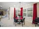 Breakfast nook with a glass table and four chairs, perfect for casual dining at 4038 Swaying Palm Ct, The Villages, FL 32163