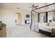 Luxurious main bedroom suite with access to the backyard at 4038 Swaying Palm Ct, The Villages, FL 32163